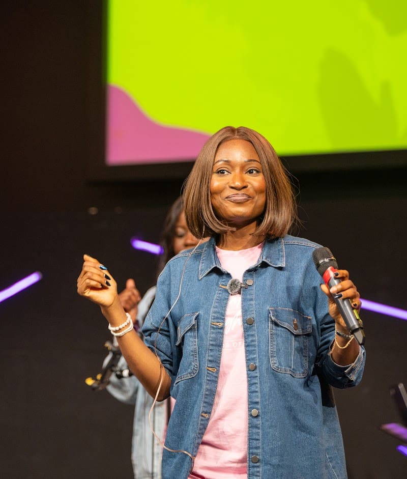 Olaide Bisola singing on stage