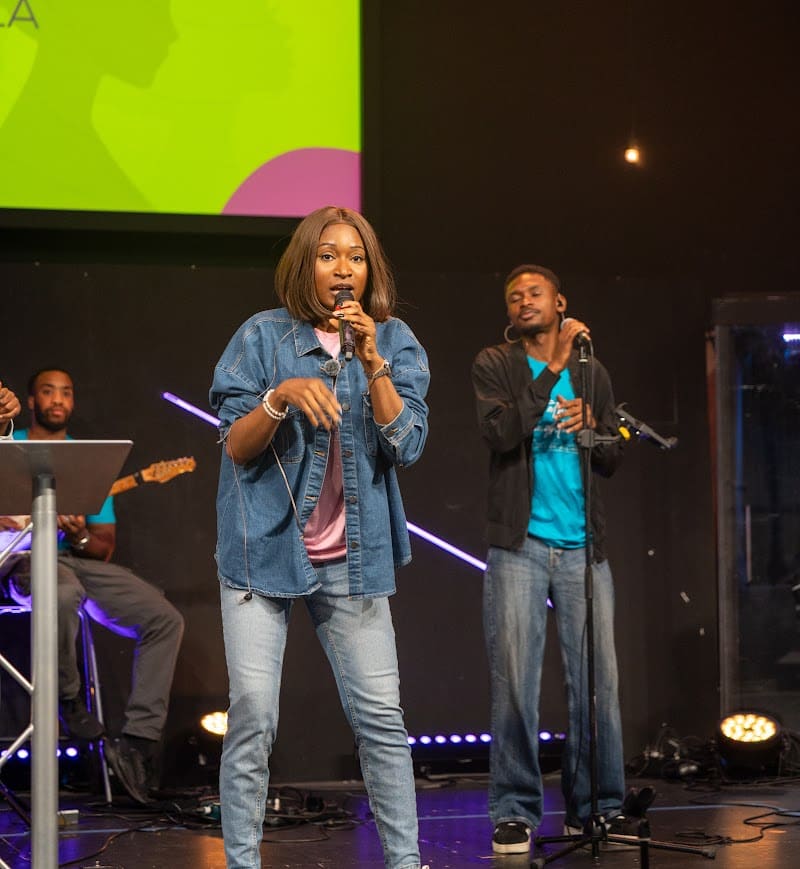 Olaide Bisola leading worship